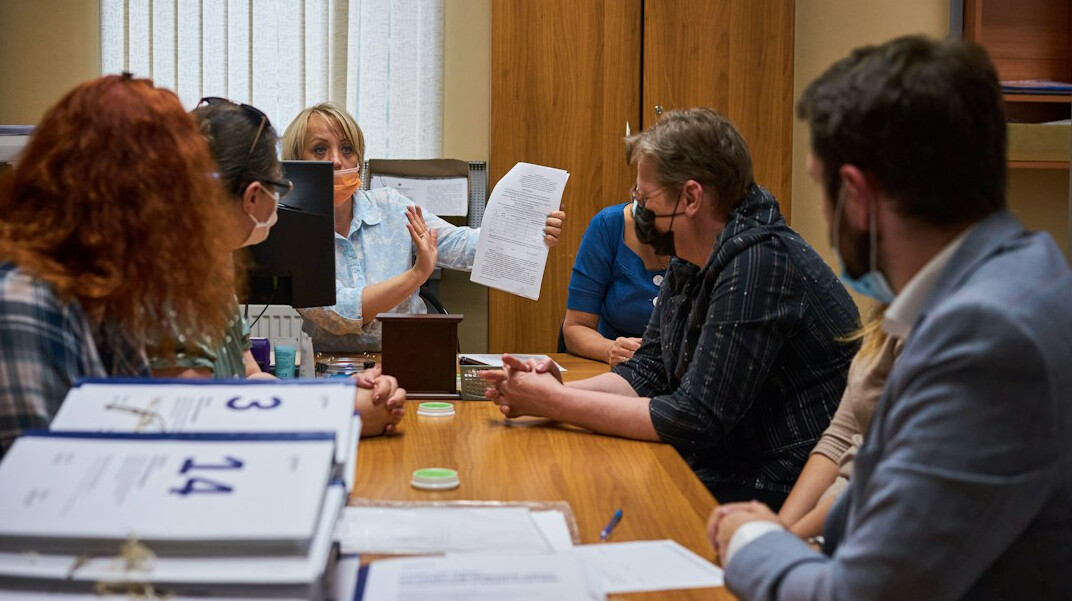 citizens reviewing public documents